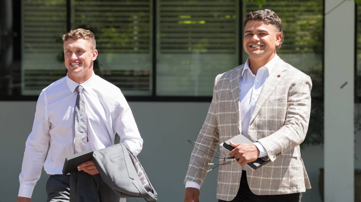 Jack Wighton and Latrell Mitchell were all smiles after charges against them were dismissed. Picture by Sitthixay Ditthavong