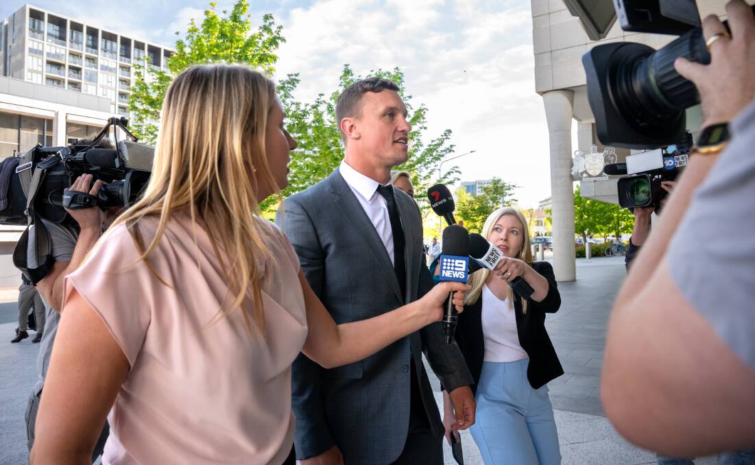 Jack Wighton is swarmed by media cameras outside court. Picture by Sitthixay Ditthavong