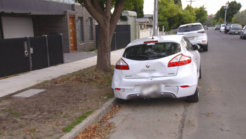 White Renault Megane allegedly dinted after the police pursuit ended on Bischoff Street in Preston. Picture via Nine News