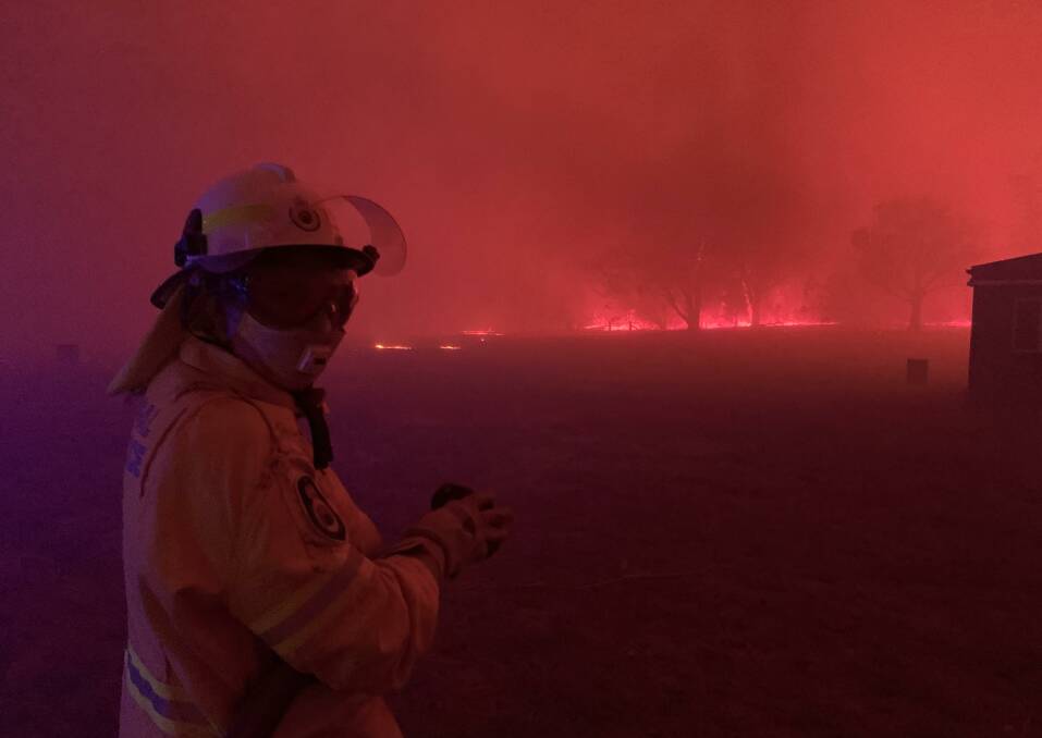 German au pair Jule Hansen, 20, on her first day on the fireground. She was defending the Nerriga fire shed. Picture: Supplied