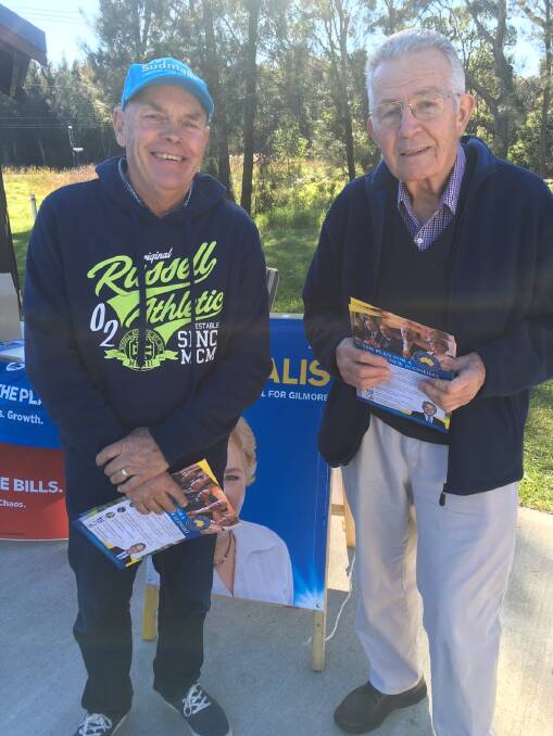 Handing out for the Liberal Party at Tomakin were Robbie Law and Peter Henderson.