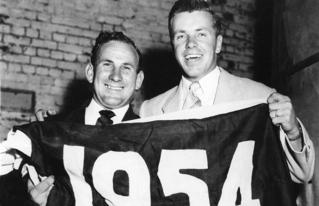 Winners: Charlie Sutton and Ted Whitten celebrate Footscray's 1954 premiership. Warrnambool's Margaret Wilson was at the game and will be at the 2016 grand final.