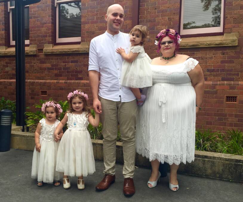 BEAUTIFUL DAY: Claire, Lily-Grace, Isabelle, Rick and Chrissy Carpenter celebrate their marriage at Nowra Courthouse on Valentine's Day.