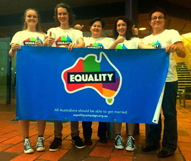 STEP FORWARD: Daisy Oke, Liam Falls, Angie Falls, Emma Falls and Dawn Hawkins celebrate the decision to support marriage equality at the council meeting on Tuesday night.