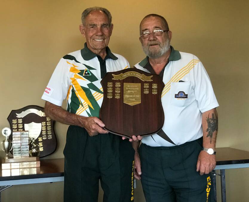 Shoalhaven Ex-Servicemen's Bowls: 2018 Club Bowler of the Year Tommy Smith (left) with Club President, John Edwards.