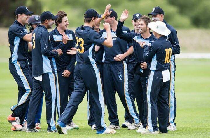 The ACT/NSW Country under 19s team celebrate a wicket against Northern Territory. 