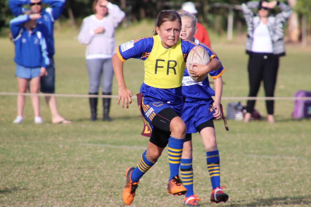 On the burst: Bomaderry's under 12 girls League Tag Player Karnae Swindale-Smith takes the ball up during a recent match.