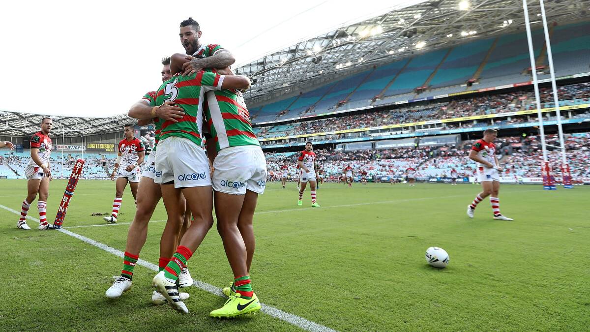 South Sydney celebrate one of their tries on Sunday. Photo: GETTY IMAGES