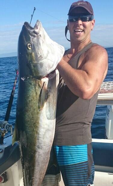 Dave Abella with a solid 1.3 metre king from the banks on Wednesday while waiting for the marlin to bite.