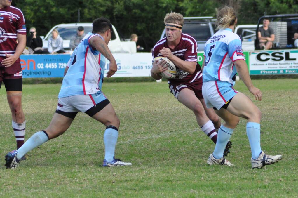 ON THE ATTACK: Albion Park-Oak Flats Eagles' Jordan Hutchison takes a hit-up against Milton-Ulladulla on Sunday. Photo: COURTNEY WARD