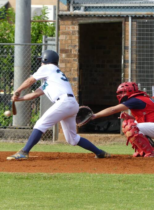 PITCH THAT IS TOO HOT TO HANDLE: Mark Donne's bat bends, as it collides with the ball and he tries to score a run, during last weekend's game for the Shoalhaven Mariners. Photo: LISA PEARSON