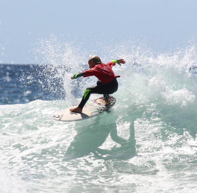 REMEMBER THE NAME: Lake Tabourie's Koby Jackson on his way to winning the under 10s boys Wahu Surfer Groms Competition in Kiama. Photo: STEVE CONTI