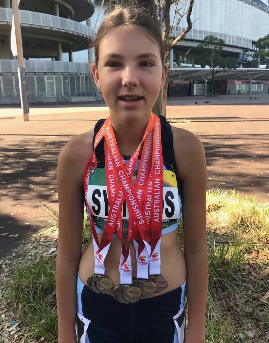 TRACK STAR: Shoalhaven Heads' Karlee Symonds claimed three gold and one bronze medal at the recent Australian Junior Athletics Championships.