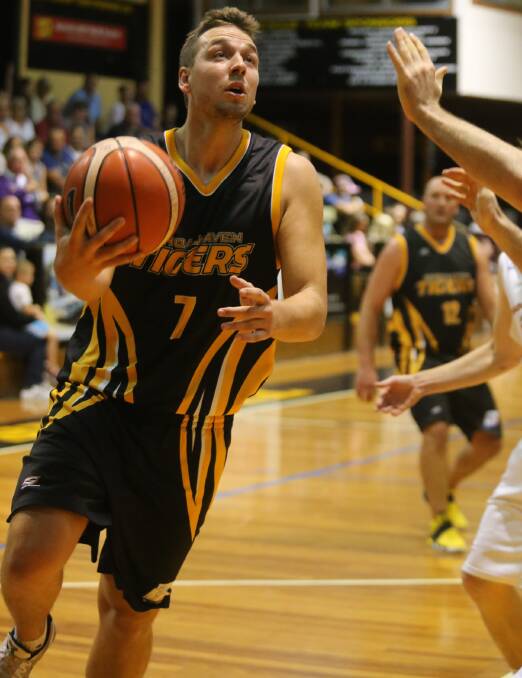 SHOOTING STAR: Shoalhaven Tigers' William Ozolins managed 20 points in Saturday's win against the Heat. Photo: ROBERT CRAWFORD
