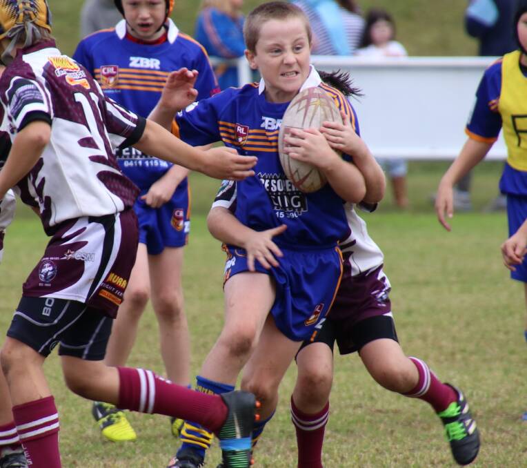 Tackle bust: Bomaderry's under 10's player Kye Marcal on the attack. The under 10’s played well but were defeated by Albion Park last weekend.