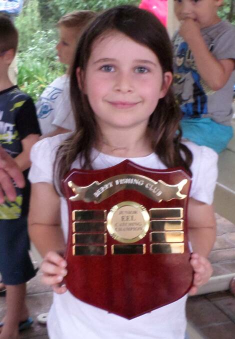 Berry nice: Young Grace Vassallo with the Junior Eel Catching Trophy. 