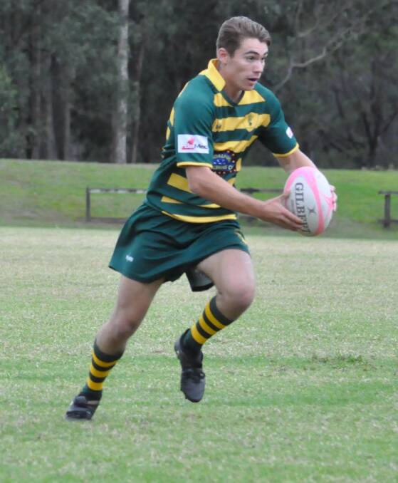 ON THE ATTACK: Shoalhaven Rugby Club's Angus Maddinson. Shoals Firsts defeated Kiama 27-17 last weekend. Photo: DAMIAN McGILL