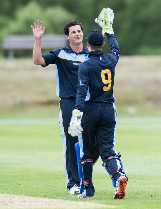 Matthew Gilkes (number nine) celebrates a wicket with a team mate. Photo: CRICKET AUSTRALIA