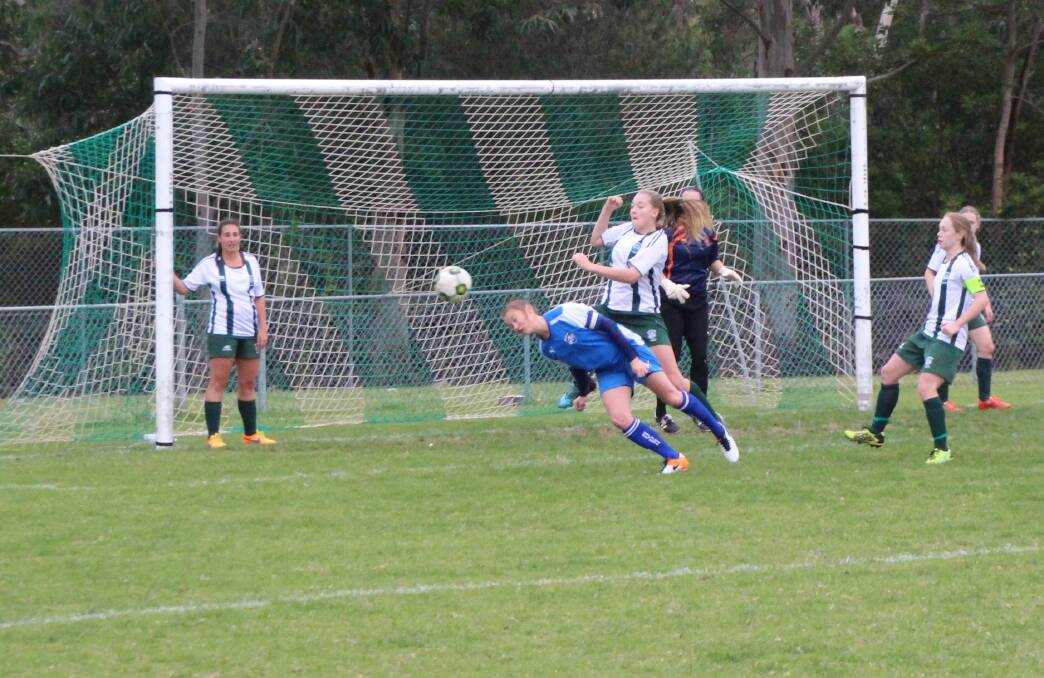No luck: Captain Sezza Hickling going in for a header against Northern Tigers on Sunday. Southern couldn't find the equaliser after Tigers went ahead 1-0. 