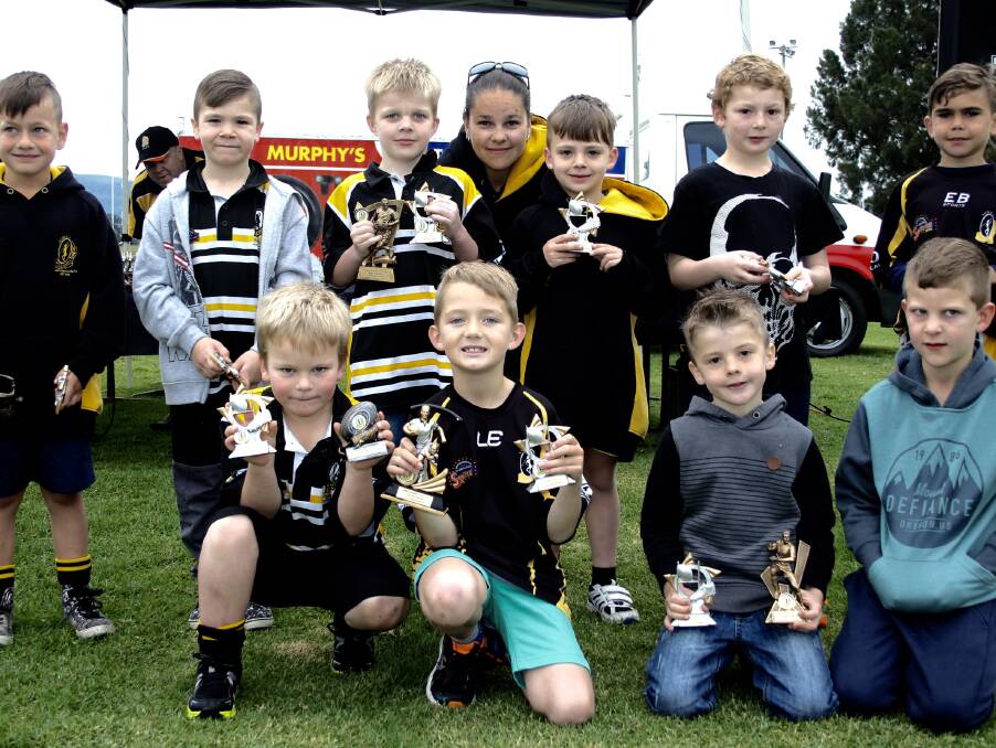 BRIGHT FUTURES: The Nowra Warriors' Nowra Physiotherapy under 7s show off their medals from Sunday's presentation day at Lyrebird Park.