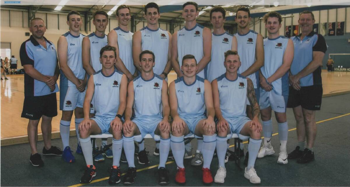 TEAM: Jack Donovan (back row, third from left), Joshua Mayo (back row, fifth from left), Callum Mackay (front row, first on left) and their NSW under 21 men’s indoor hockey side.
