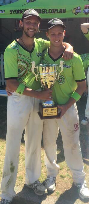 OVER THE MOON: Nathaniel Jones and his Sydney Thunder team mate Ben Patterson, after they defeated Hobart in the Big Bash League Indigenous Twenty20 Cup.