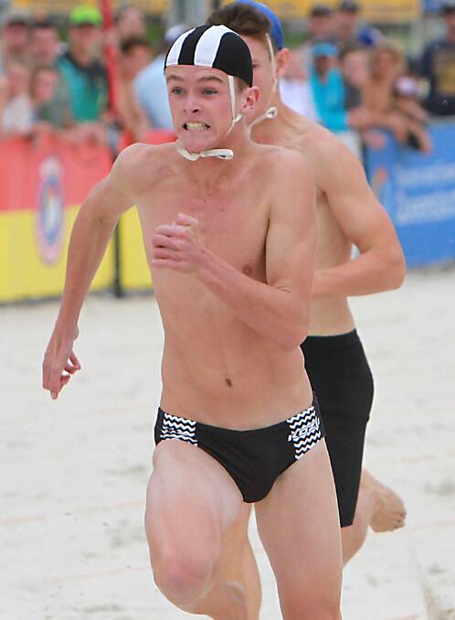 NATIONAL CHAMPION: Mollymook's Keeghan Norwood flies home to win gold in the u15s beach sprint at the weekend. Photo: HARV PIX