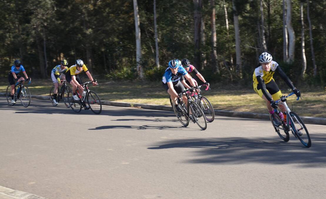 Bad luck: Mark Astley leads Aaron Lauder and the division one field in last Sunday's criterium at Albatross Aviation Tech Park. Astley's day ended with a broken spoke in his front wheel. 