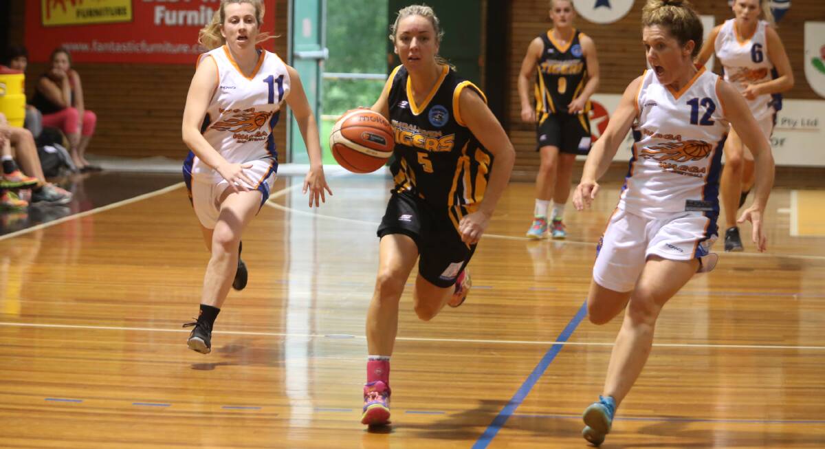 SCORING MACHINE: Shoalhaven Tigers' Kate Denyer chalked up 24 points in her team's overtime win against the Wagga Wagga Blaze. Photo: ROBERT CRAWFORD