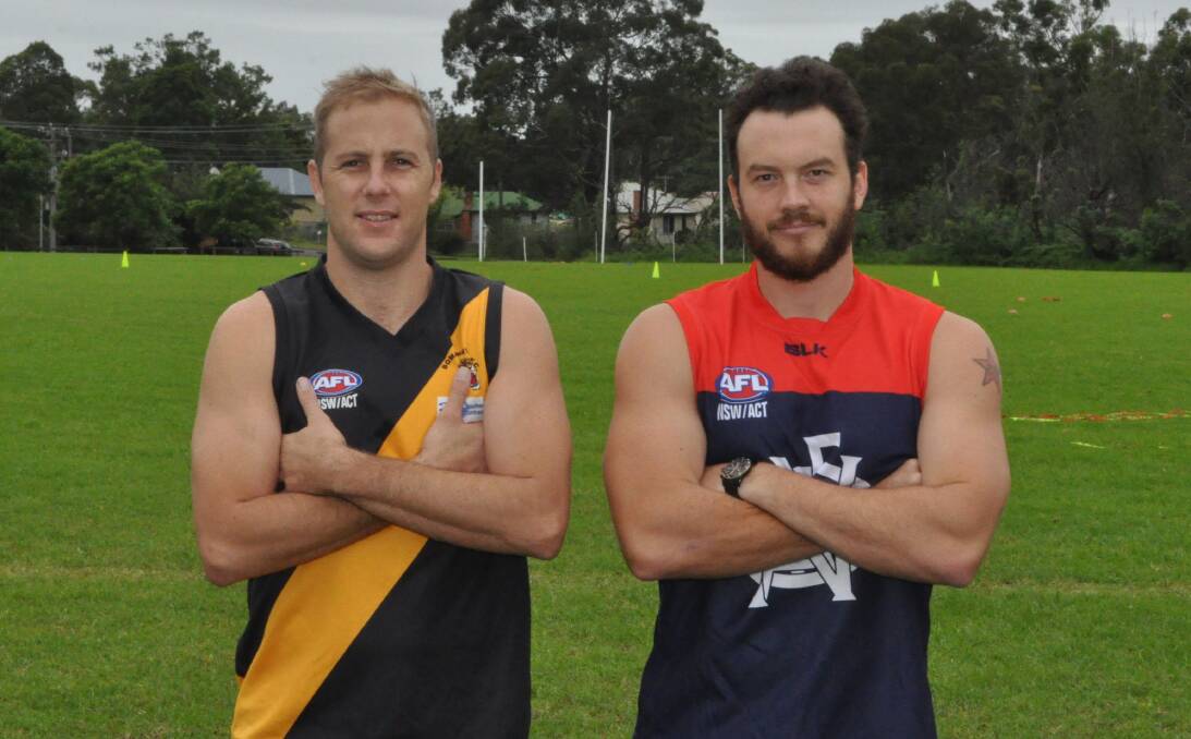 DETERMINED TO SUCCEED: Cross town South Coast AFL rivals, Andrew Lee (Bomaderry) and Brad Barnes (Nowra/Albatross), will hope to lead their team to victory on Saturday. Photo: COURTNEY WARD