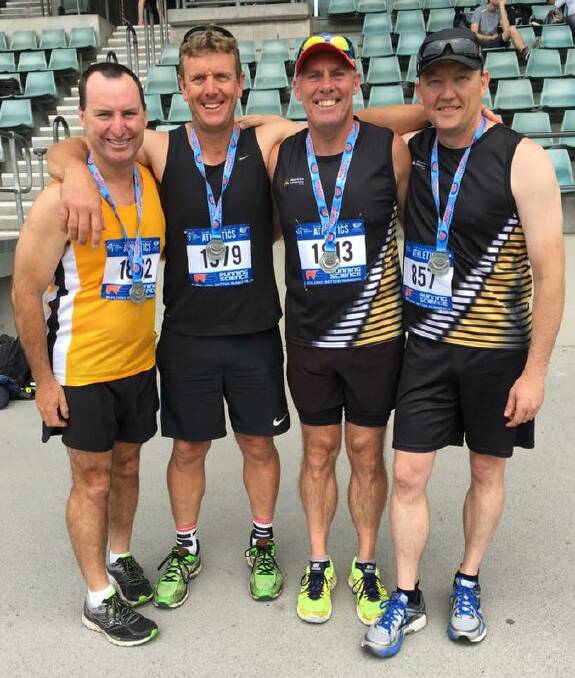 Joint effort: Nowra Athletics Club's Mark O’Leary, Kane Barrett, Geoff Crook and Steve Thomson won silver in the 160+ javelin event at the NSW Relay Championships.