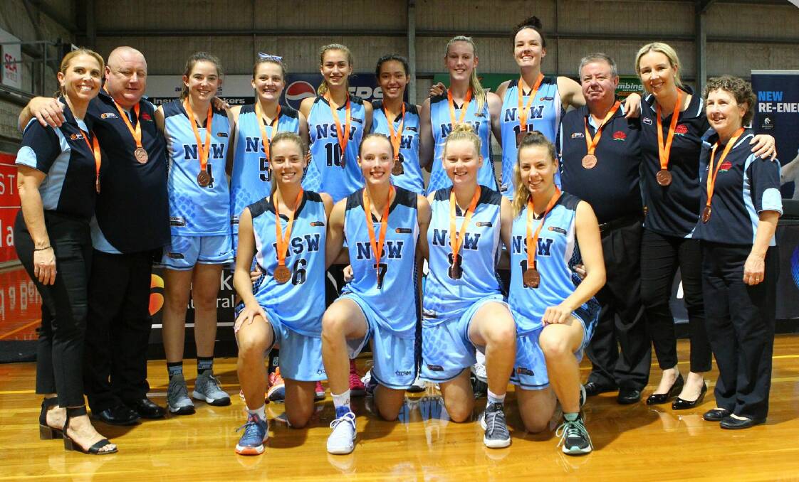 DOING HIS STATE PROUD: Shoalhaven's Scott Balsar (second from left) and his New South Wales women's under 20s basketball side. Photo: BASKETBALL AUSTRALIA