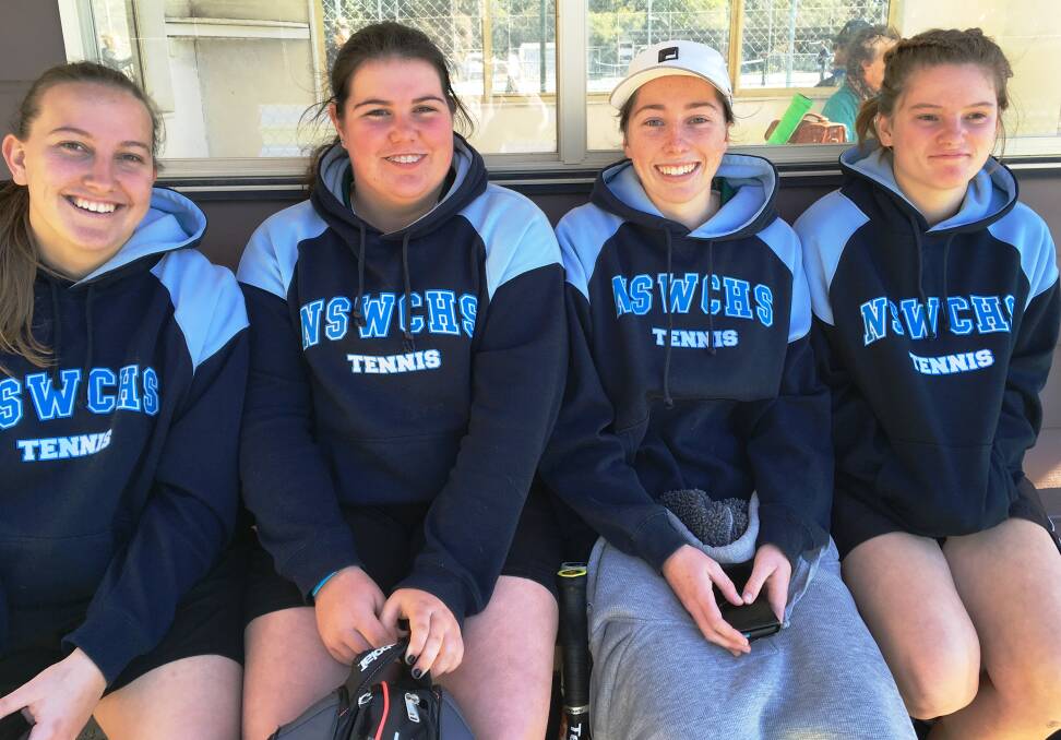 Great effort: Casey Anderson, Morgan Smith, Brittany Anderson and Hannah Webb rest between matches at the CHS Floris Conway Cup recently. The girls finished sixth.