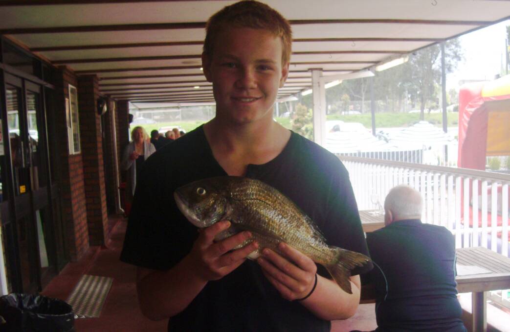 Top fish: Shoalhaven Heads Bowlo's Fishing Club junior member Louie Chilver won biggest bream at the inter-club outing against Archer.