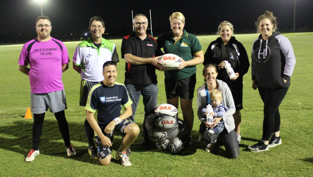 Nowra-Shoalhaven Touch Association's Belinda Holt (back row, third from right) has been awarded a 2019/20 NSW Touch Blue Award. Photo: Supplied