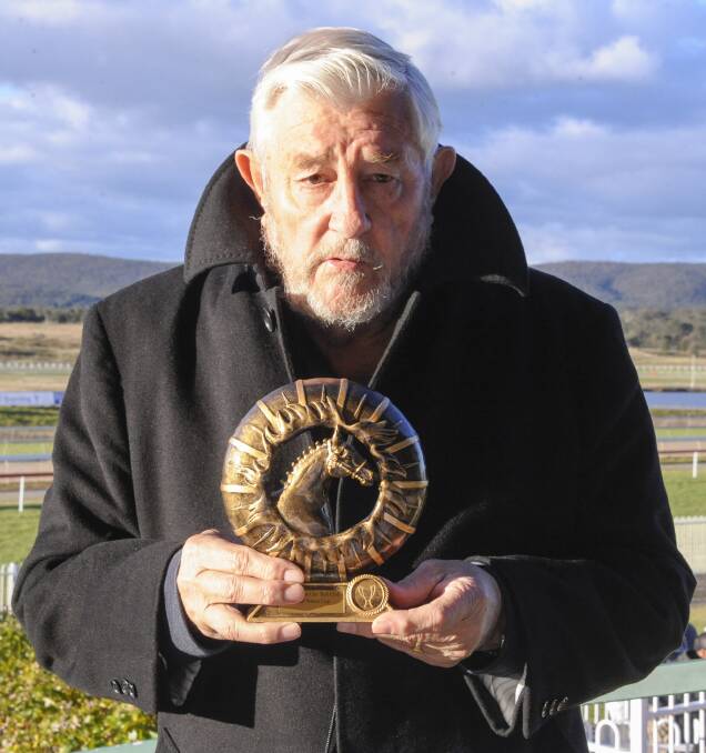 Trainer Keith Dryden with his Nowra Cup trophy. Photo: BradleyPhotos.com.au
