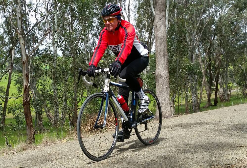Picturesque trail: Shoalhaven Bicycle User Group president Mel Gillott on last year’s Victorian Rail Trails ride. Picture: SUPPLIED