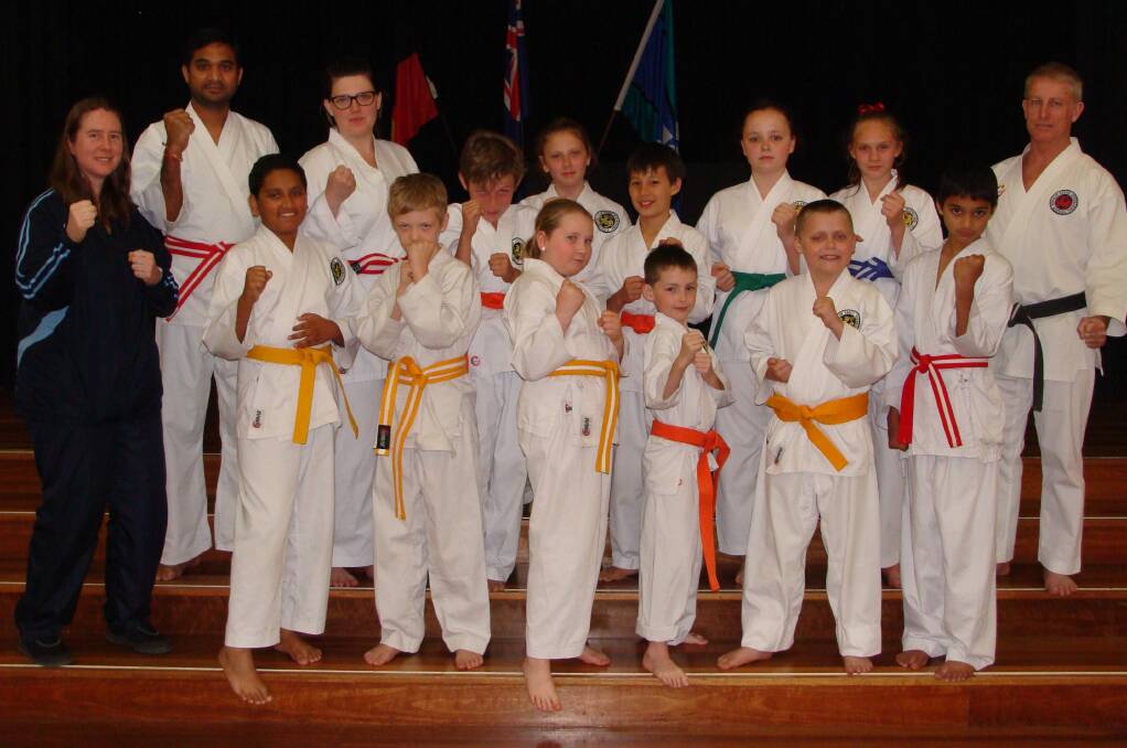 Great result: The successful Shotokan Karate students on Grading Day. One of the club's mottos is "A black belt is just a white belt that never gave up”.