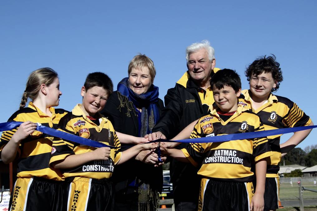 EXCITED: Gilmore MP Ann Sudmalis, Les Harris with Warriors players.