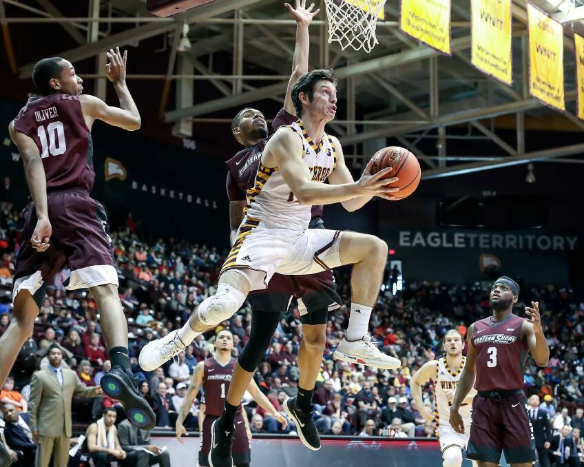 Eagles' Kyle Zunic drives to the basket. Photo: WINTHROP ATHLETICS