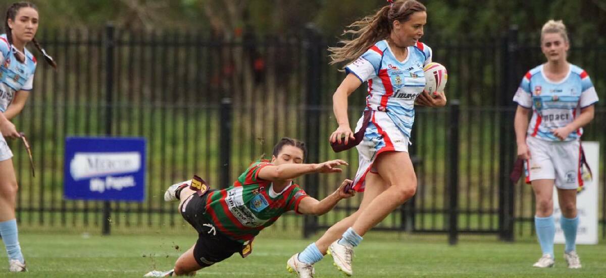 NOT SO FAST: Jamberoo's Brooke Smith tags Milton-Ulladulla's Emmah Haynes in Sunday's Women's League Tag grand final: Photo: TIM DELANEY