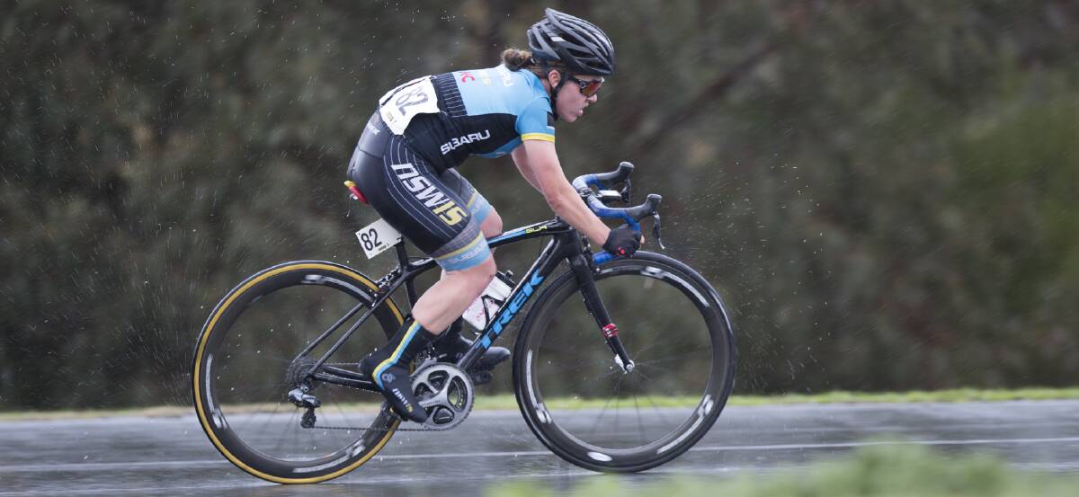 Sprint: Jade Colligan racing in the rain at the Sutherland Criteriums at Waratah Park last Friday. Picture: Supplied