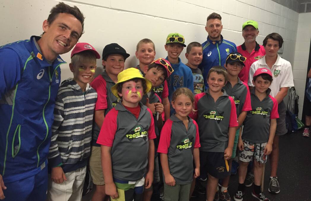 FUN TIMES: Australian cricketers Stephen O'Keefe and James Pattinson with Michael Ramsden and last year's Ulladulla T20 Blast players and assistants.