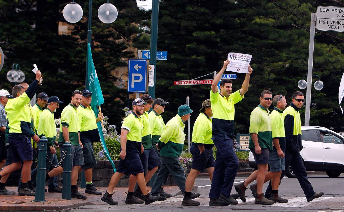 No way: Kiama Council workers protest shortly after hearing the NSW government was proposing a merger with Shoalhaven.