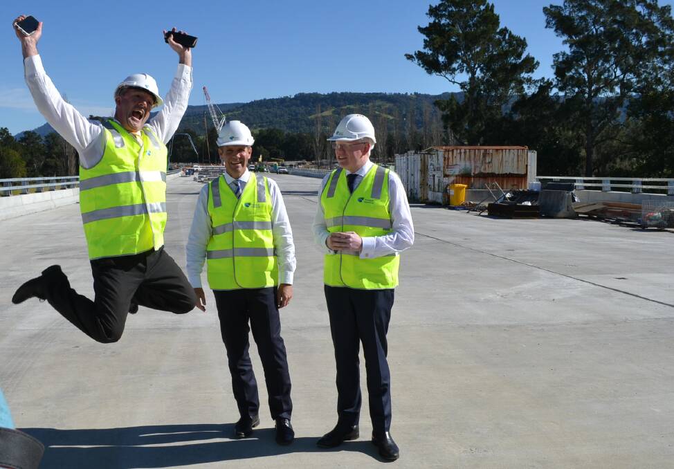 SNAP HAPPY: Former Shoalhaven Mayor now MLC Paul Green was overcome with joy when with then Premier Mike Baird and Kiama MP Gareth Ward he inspected progress on the Berry bridge in May last year. 