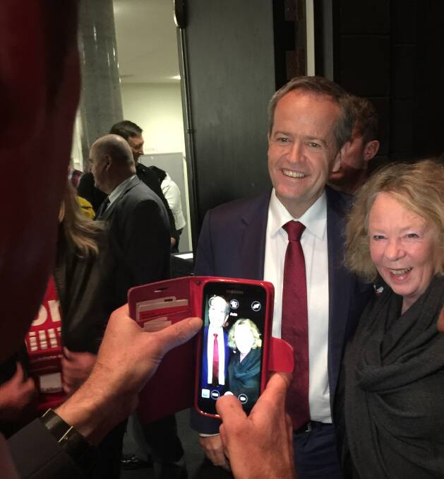 HAPPY SNAP: Opposition Leader Bill Shorten poses for a photo after the town hall style meeting at the Shoalhaven Entertainment Centre.