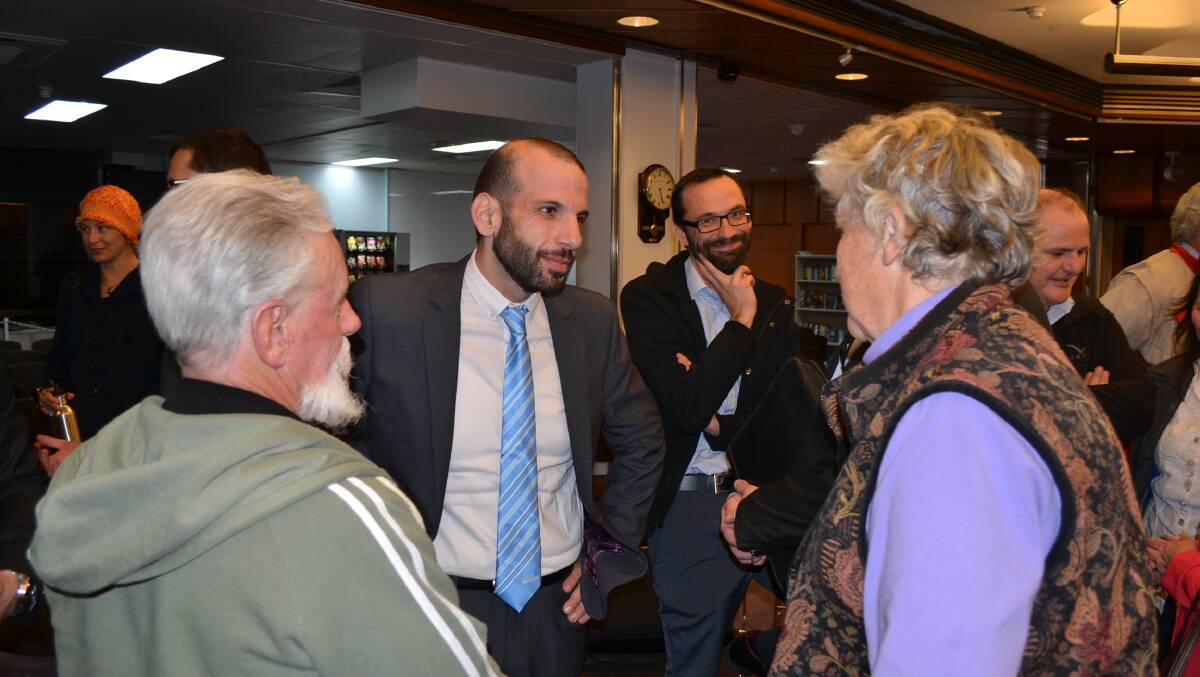 PLANS ABANDONED: Motorcycling NSW's then general manager Daniel Gatt talks with then Shoalhaven Mayor Joanna Gash at the June 2016 JRPP hearing in Nowra.