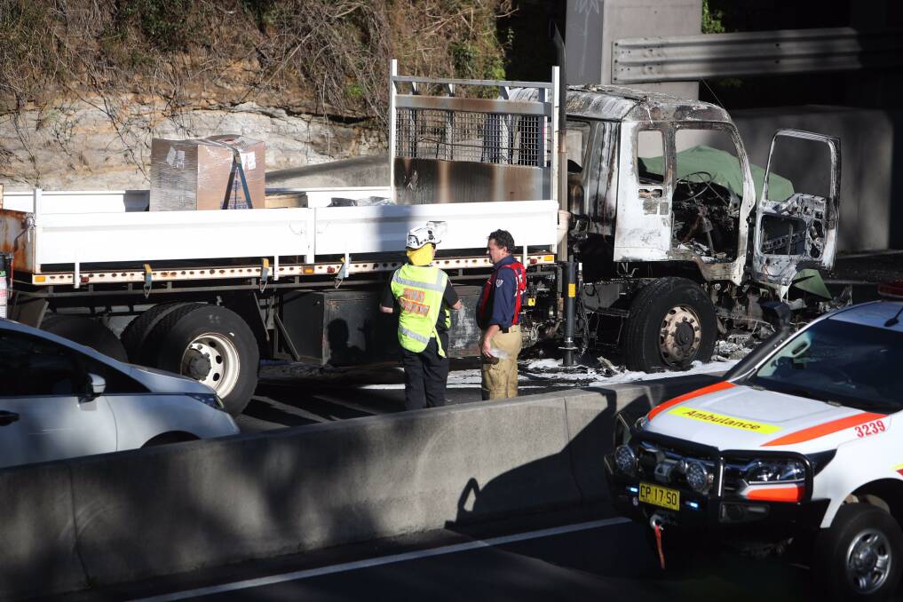 Tragedy: John and Cathy's car was caught between two trucks before it burst into flames in June. Picture: Adam McLean