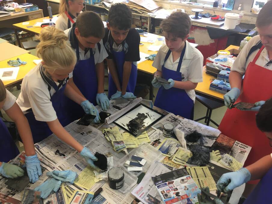 Year 7 doing print making: Students at Nowra High School are involved in many educational activities, cultural, community and sporting pursuits.