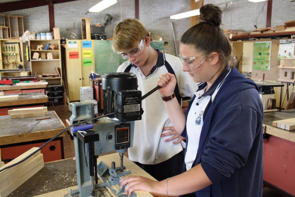 Woodworking at Nowra High School: While technology subjects are still encouraged, there is more emphasis on vocational subjects for a comprehensive education.